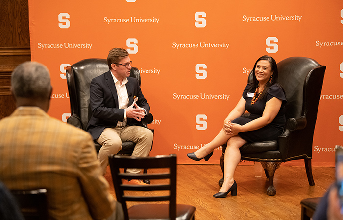Chris Velardi '95 moderates a conversation with Mary Grace Almandrez